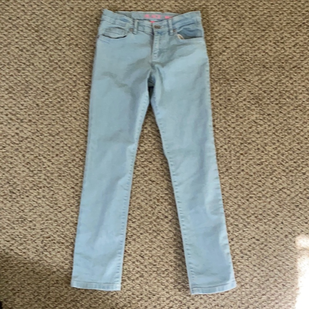 The Children’s Place, light washed skinny blue jeans.